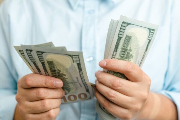 Businessman Benefits from Merchant Cash Advances Money Issues